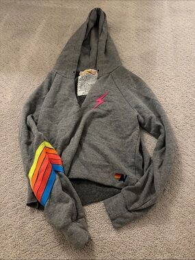 Aviator Nation Gray Cropped Hoodie with Rainbow Sleeve and Pink Lightning Bolt